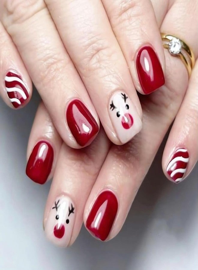 OCOUYVD Christmas Short Square Press on Nails Winter Xmas Red and White Stripe Reindeer Designs Pink Glossy False Nail Full Cover Christmas Acrylic Stick on Nails for Women Nail Art DIY 24 Pcs - Image 1
